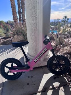Strider kids balance bike pink