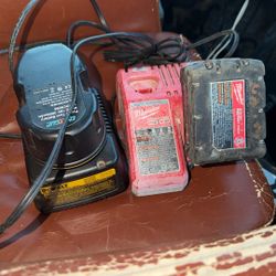 Multiple Milwaukee 48‑59‑1812 Charger And Battery 15$