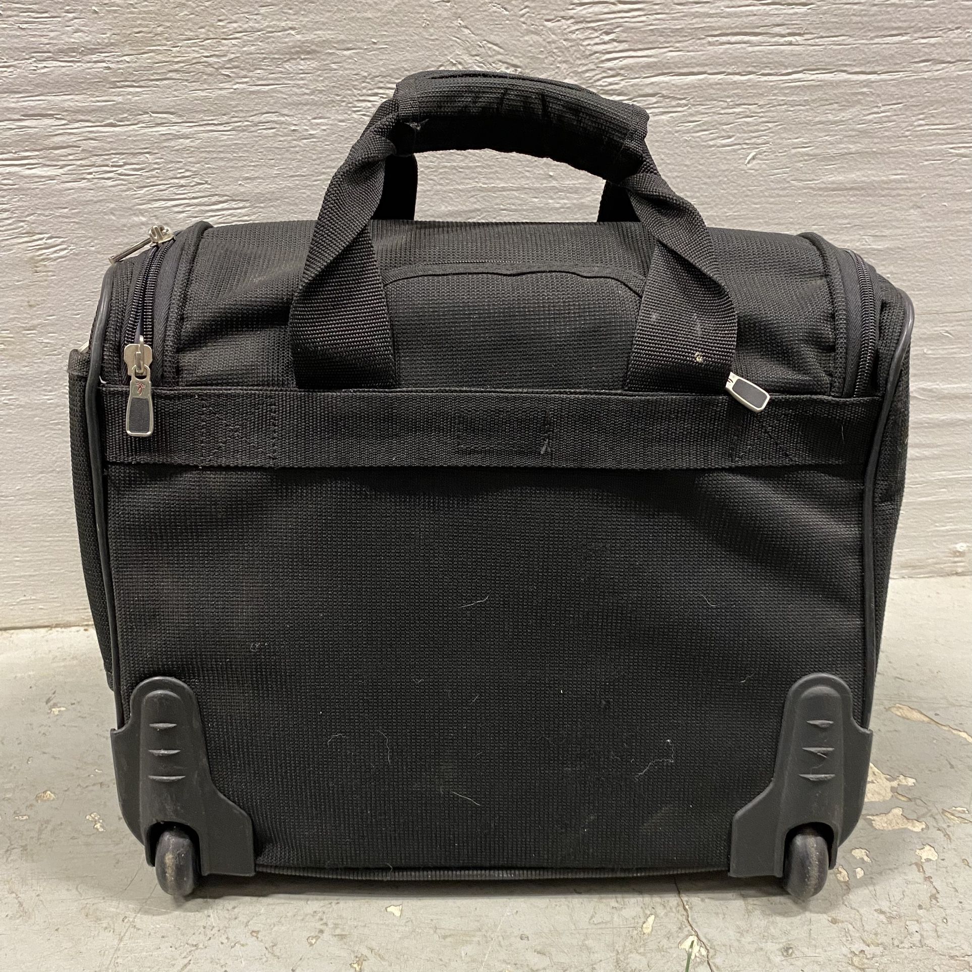  Ricardo Beverly Hills Black Carry-On Personal Item Travel Bag  Great pre-owned condition.   Measurements:  16” Wide x 13 1/2” Tall x 10” Deep  Pick u