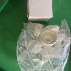 Never Used Breast Pump and  Sterilized Bottles