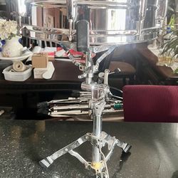 mirror, chrome Pearl snare, drum, and stand