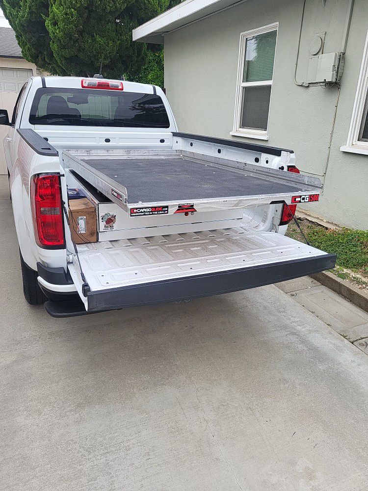 Roll out truck bed tray