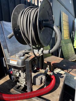 Gas pressure washer with 100 foot real