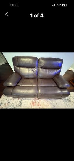 Brown leather loveseat