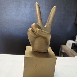 Gold peace hand decor