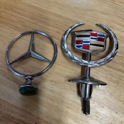 Two Car Emblems 