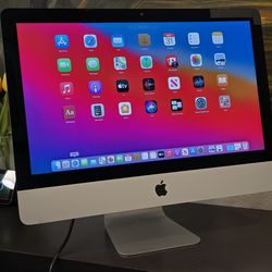 iMac 21.5-inch, Mid 2014
Functions well
Has a covered crack
