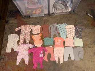 0-3 months Baby Girl Bundle. Assorted baby girl clothes in pinks, coral, teal and floral prints. Includes onesies, sleepers, rompers, and pants with r