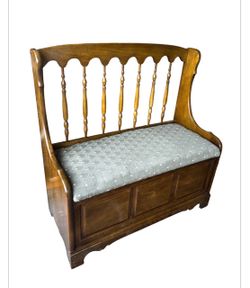 Spindle back hallway bench with storage and sage green upholstery Americana cottagecore style