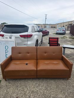 Busget camel faux futon, blemished seat as shown, works good, pre-owned