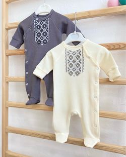 Beautiful Ukrainian-inspired romper for a baby boy.
