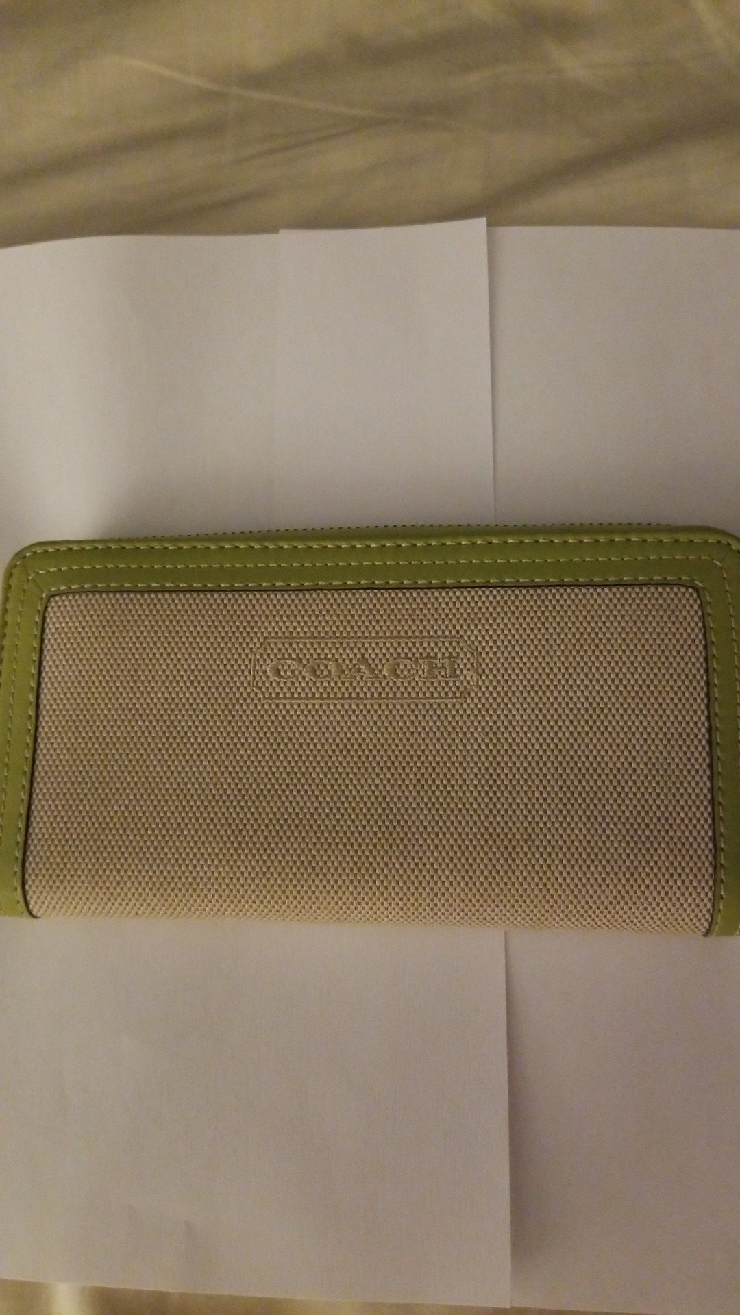 Coach zippered wallet.