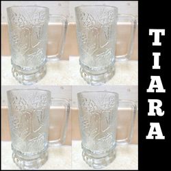 Tiara Indiana Glasswear Ponderosa Pine Cone Tree Beer Mugs Set of 4 

VINTAGE EXCLUSIVE

Brand New In Box

One Glass Has The Orginal Sticker As Shown 