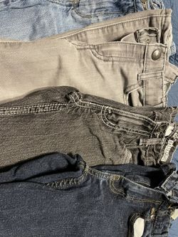 Four Pairs Of Boys Jeans