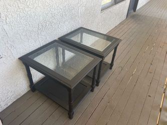 Two glass coffee tables
