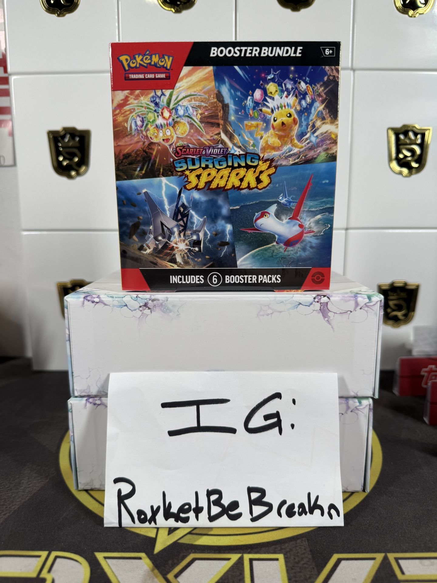 In Stock: 4x Surging Sparks Booster Bundle