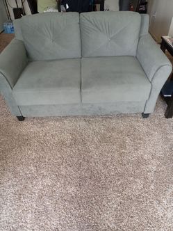 Blue fabric loveseat