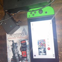 Nintendo Switch Bundle 2 Games Mario Odyssey And Assassins Creed