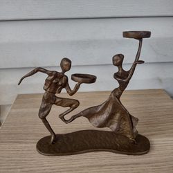 Bronze figurine candle holder