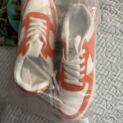 Orange and White Don’t Know Brand And 9 Or 10 In A Half 