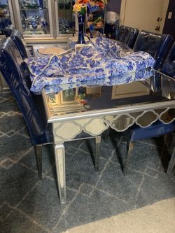 Mirror Dinning table & 6 blue bedazzled velvet chairs $1500