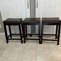 3 Counter Height Brown Wood Bar Stools With Leather Padded Seats