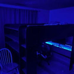 Bunk bed with desk under