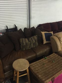 Leather couch with pillows