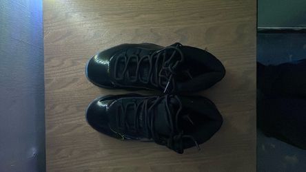 Air Jordan 11 Black Patent Leather Sneakers