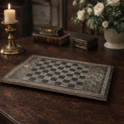 Antique hand-carved stone chessboard