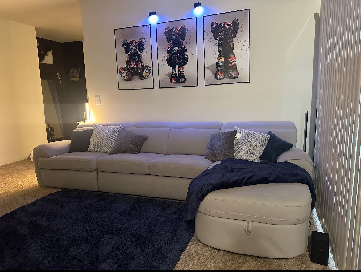 Aero Powered Sectional w/ pull out sleeper and storage $1900 obo. Pick up location in Rosedale.
