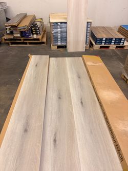 Grey vinyl plank floors - $1.49sf IN STOCK