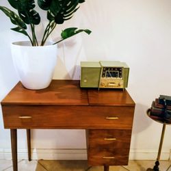 Mid Century Sewing Table
Very rare find, in mint condition. Great for any location of the house. Solid wood.
