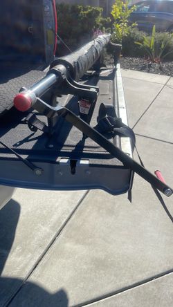 Truck bed cargo unloader