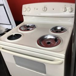 GE Coil Top Range. 1 year Warranty 