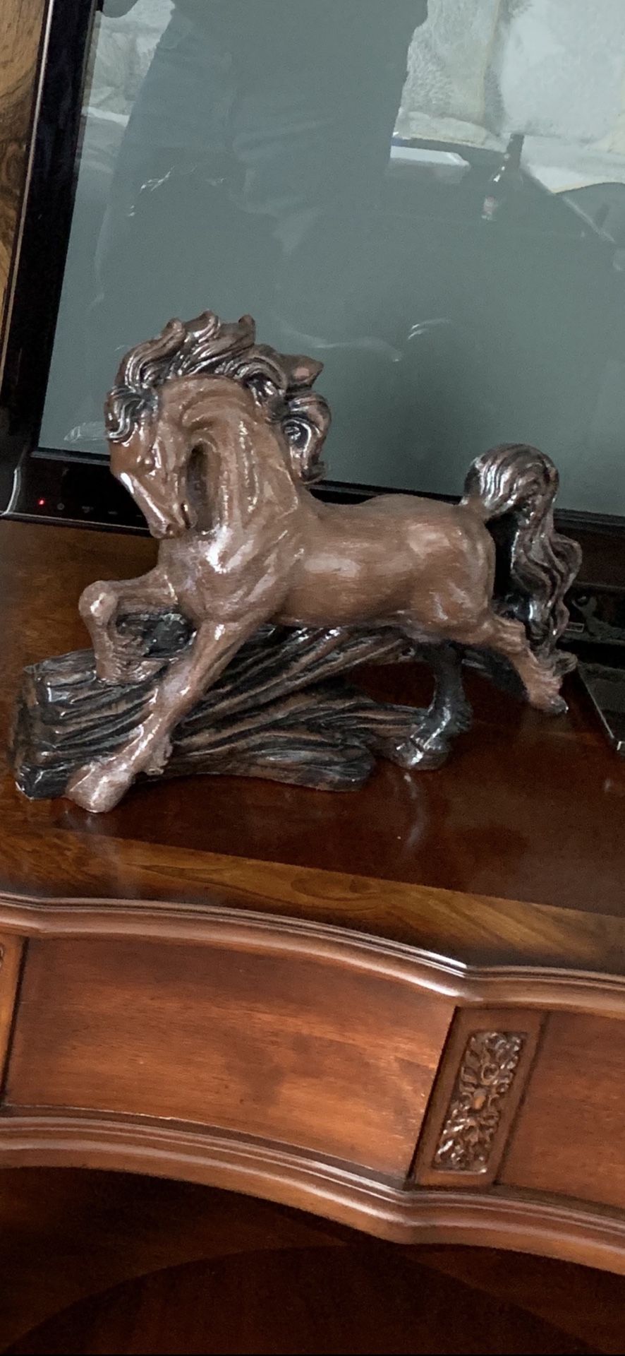 Horse Jumping Over Log Statue