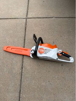 New Stihl MSA 80C battery operated chainsaw and cover
