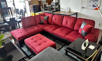 Red microfiber sectional couch and ottoman