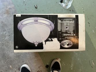 Hampton Bay 14-inch incandescent flush mount ceiling light fixture.