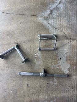 Pulley attachments for weightlifting rack