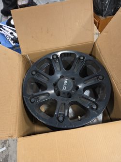 Used Black Helo Rims – 6x5.5 Bolt Pattern (Fits 2006 GMC Sierra 1500)