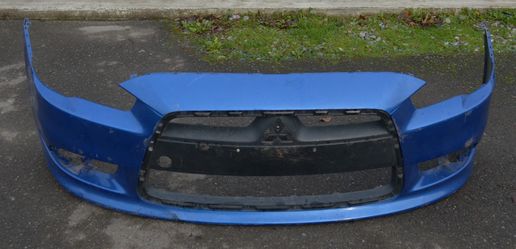 USED REF#U0547 || 2009-2015 MITSUBISHI LANCER || FRONT BUMPER COVER ONLY