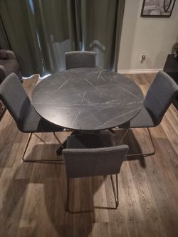 Gray Upholstered Dining Chairs with Chrome Legs