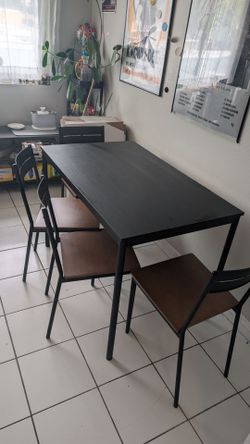 Table and Four Chairs