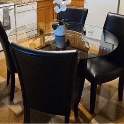 GLASS TABLE AND CHAIRS 