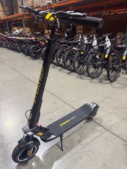 High-end electric scooter with front and rear shock absorption
