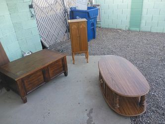 Storage table, jewelry storage stand, and regular low table