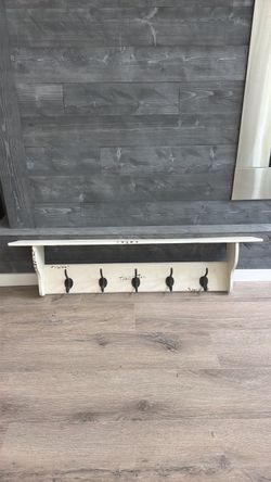 Shelf with hooks