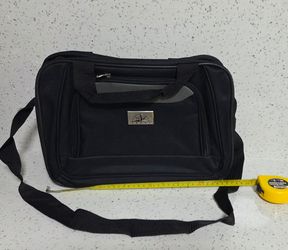 Verdi Travel Bag. 14.5x10.5x4.5. Handles, Front Pocket, Back Strap To Attach To Luggage. Black