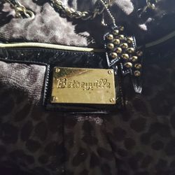 Betseyville by Betsey Johnson animal print weekender or travel bag.